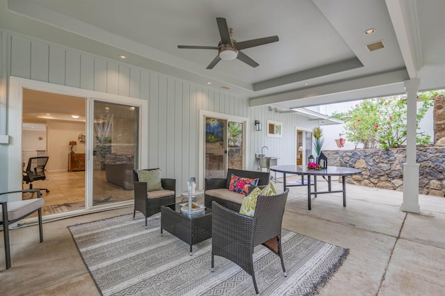 view of patio / terrace with visible vents, outdoor lounge area, and a ceiling fan