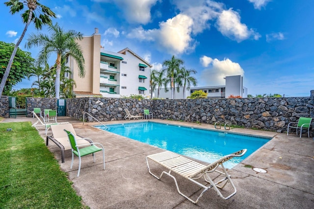 2180 W Vineyard St Unit 212, Wailuku, HI 96793 - view of swimming pool with a patio area