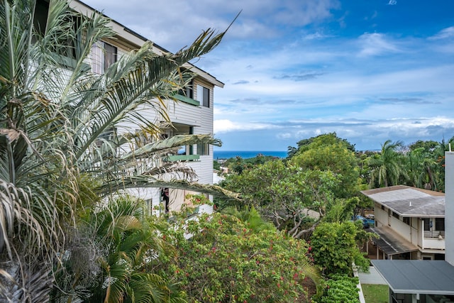 exterior space with a water view