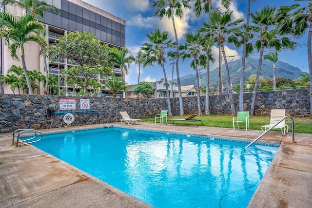 view of pool with a mountain view