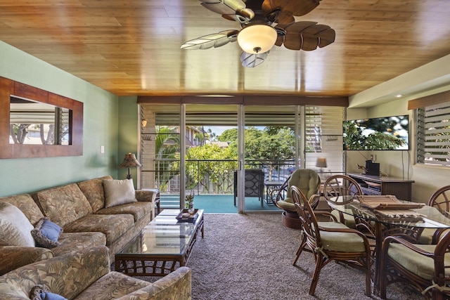 living room with carpet, ceiling fan, and wooden ceiling