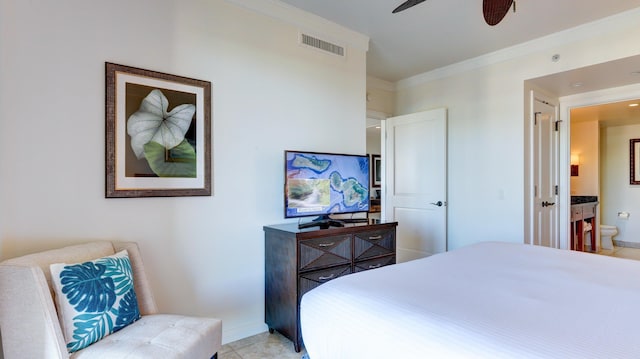 bedroom with light tile patterned floors, ceiling fan, ensuite bathroom, and crown molding