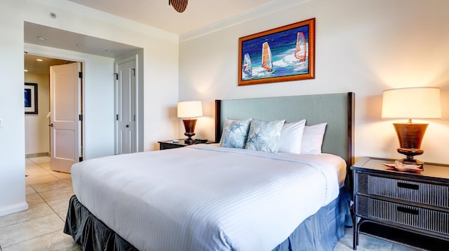 tiled bedroom with crown molding