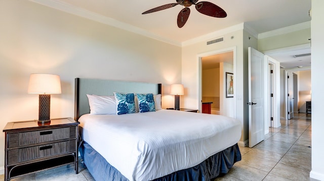 tiled bedroom with ceiling fan and crown molding