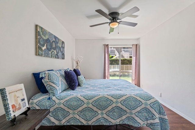 480 Kenolio Rd Unit 13-101, Kihei, HI 96753 - bedroom featuring wood finished floors, baseboards, ceiling fan, and access to outside