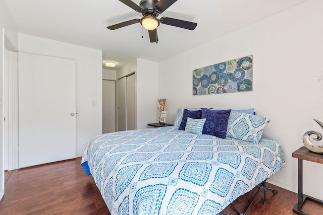 480 Kenolio Rd Unit 13-101, Kihei, HI 96753 - bedroom with wood finished floors, a ceiling fan, a closet, and baseboards