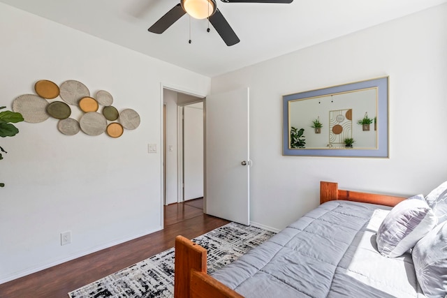 480 Kenolio Rd Unit 13-101, Kihei, HI 96753 - bedroom with wood finished floors, baseboards, and ceiling fan