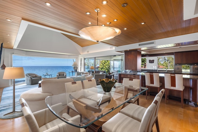 4000 Wailea Alanui Dr Unit 502, Kihei, HI 96753 - dining room featuring wood ceiling, plenty of natural light, light wood-style flooring, recessed lighting, and a water view
