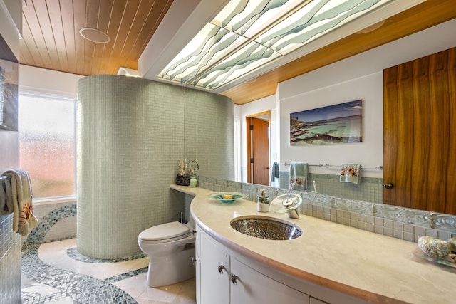 4000 Wailea Alanui Dr Unit 502, Kihei, HI 96753 - bathroom featuring tile patterned flooring, toilet, vanity, and wood ceiling
