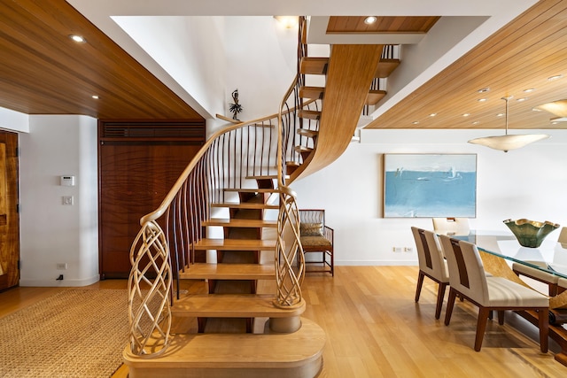 4000 Wailea Alanui Dr Unit 502, Kihei, HI 96753 - staircase featuring wood finished floors, recessed lighting, baseboards, and wood ceiling