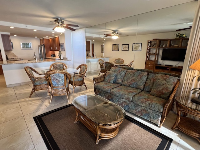 living area featuring recessed lighting, light tile patterned flooring, and ceiling fan