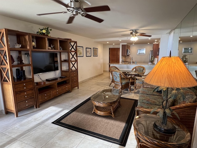 living area featuring light tile patterned floors, recessed lighting, and ceiling fan