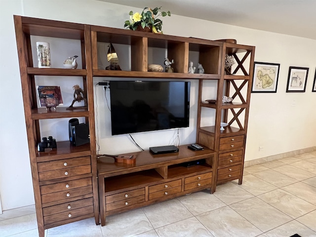 living area featuring light tile patterned floors