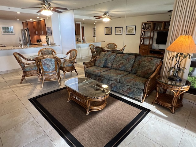 living room with light tile patterned floors, recessed lighting, and ceiling fan