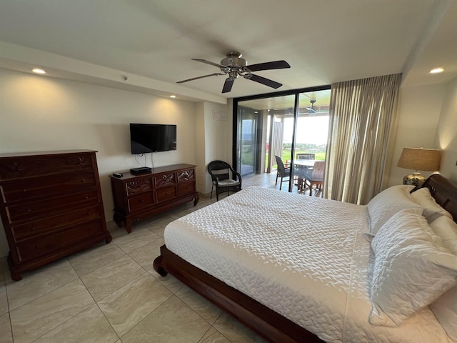 bedroom featuring recessed lighting, access to exterior, a ceiling fan, and expansive windows