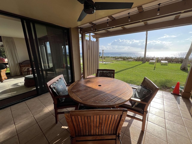 view of patio featuring outdoor dining space and ceiling fan