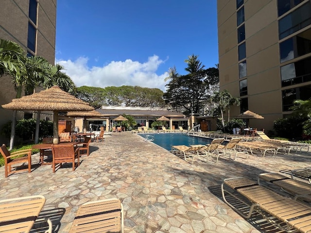 community pool with a patio