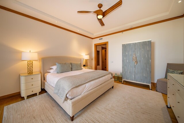 bedroom featuring ceiling fan and wood-type flooring