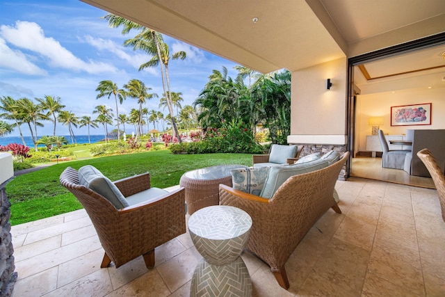 view of patio featuring an outdoor living space and a water view