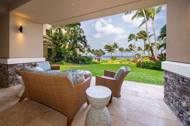 view of patio / terrace featuring an outdoor living space and a water view