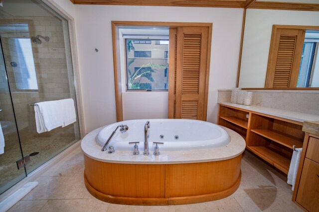 bathroom featuring independent shower and bath and vanity