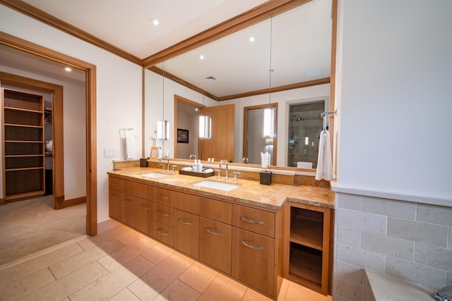 bathroom featuring crown molding, walk in shower, and vanity