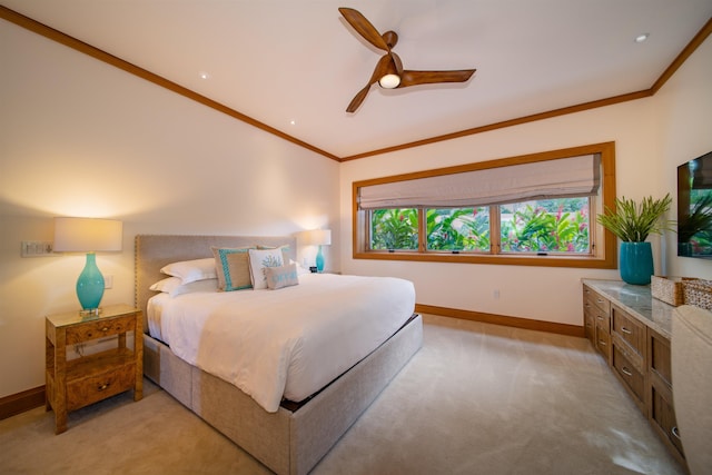 carpeted bedroom with ceiling fan and crown molding