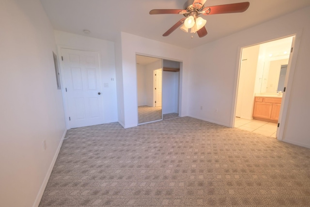 40 Halili Ln Unit 4J, Kihei, HI 96753 - unfurnished bedroom featuring light colored carpet, baseboards, and a closet