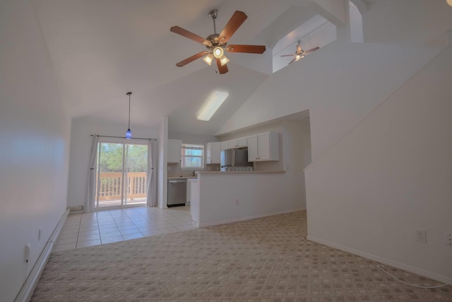 40 Halili Ln Unit 4J, Kihei, HI 96753 - unfurnished living room with high vaulted ceiling, ceiling fan, light colored carpet, baseboards, and light tile patterned floors