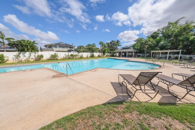 40 Halili Ln Unit 4J, Kihei, HI 96753 - community pool with a gazebo, a patio area, and fence
