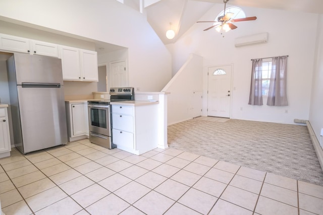 40 Halili Ln Unit 4J, Kihei, HI 96753 - kitchen featuring stainless steel appliances, light carpet, light countertops, white cabinetry, and a wall mounted AC