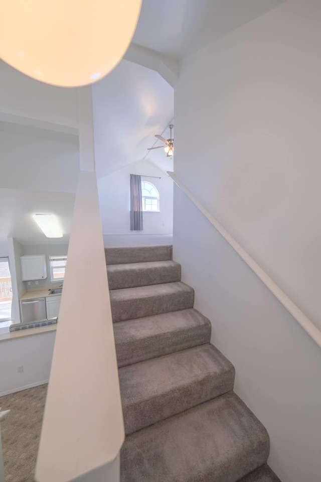 40 Halili Ln Unit 4J, Kihei, HI 96753 - stairway featuring vaulted ceiling, ceiling fan, and carpet