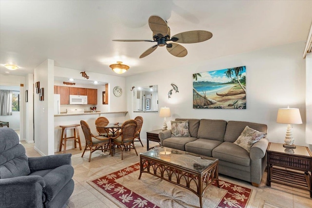 living room with ceiling fan