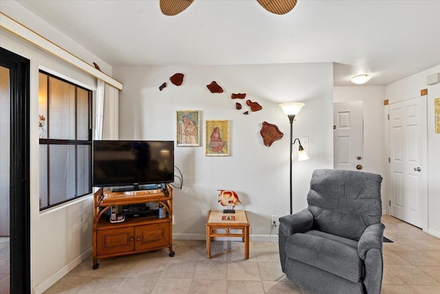 sitting room featuring light tile patterned floors