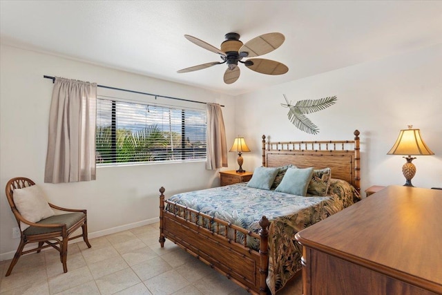 bedroom featuring ceiling fan and light tile patterned flooring