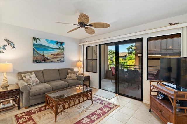 tiled living room featuring ceiling fan