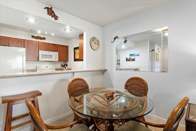 view of tiled dining room