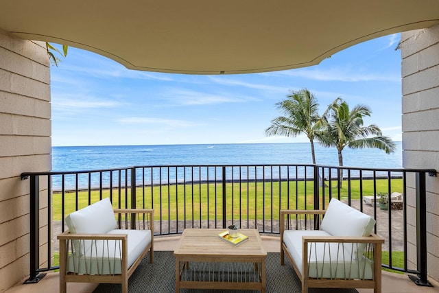 balcony with a water view and outdoor lounge area