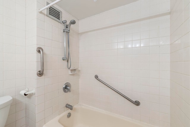 full bathroom with visible vents, shower / bathing tub combination, and toilet