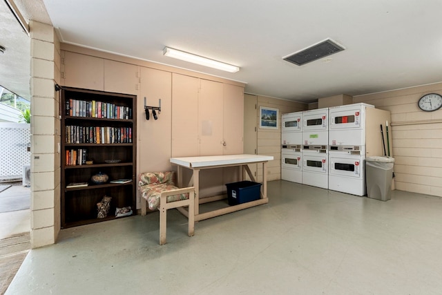 interior space with stacked washer / dryer and separate washer and dryer