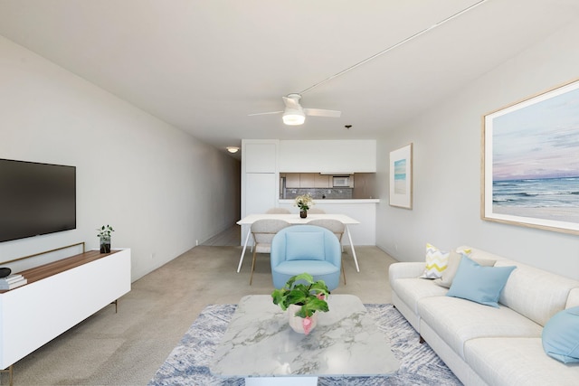 living room with ceiling fan and light carpet