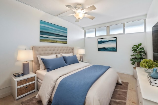 bedroom featuring a ceiling fan, carpet flooring, and baseboards