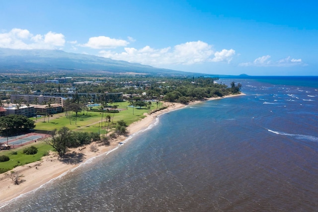 bird's eye view featuring a view of the beach and a water and mountain view