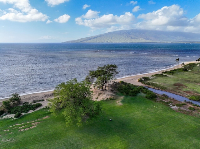 aerial view featuring a beach view and a water and mountain view