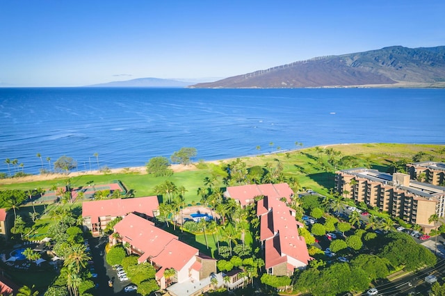 bird's eye view with a water and mountain view