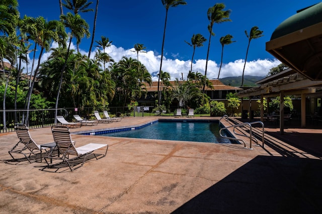 view of swimming pool with a patio