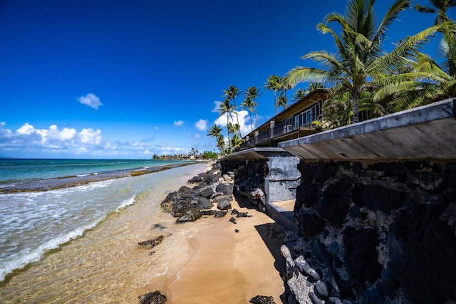 view of water feature with a beach view