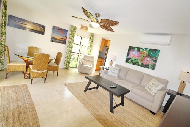 tiled living room featuring an AC wall unit and ceiling fan