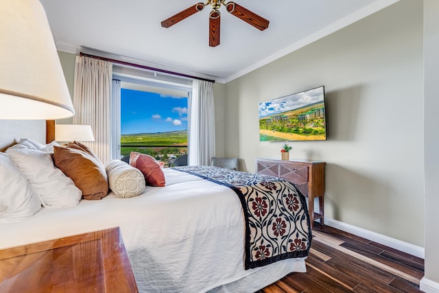 bedroom with dark wood-type flooring, crown molding, and ceiling fan