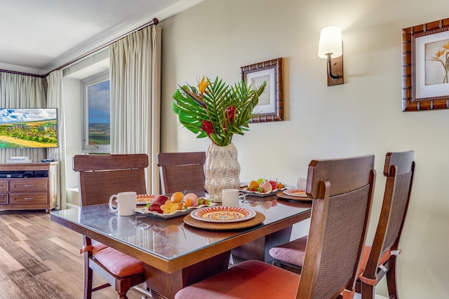 dining area featuring hardwood / wood-style floors